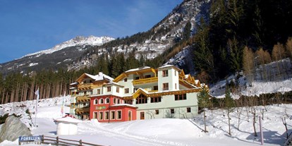 Familienhotel - PLZ 9854 (Österreich) - Winteransicht Kinderhotel Benjamin - Pirker´s Natur - Bio Familienhotel