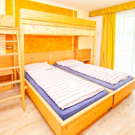 Familienhotel: Doppelzimmer Typ"Schneekönig" mit Etagenbett - Familienhotel Schneekönig