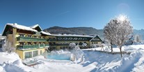 Familienhotel - Oberösterreich - Außenansicht Winter im Familienhotel Sommerhof - Familienhotel Sommerhof