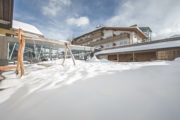 Kinderhotel: Hotel Fameli im Winter - Hotel Fameli