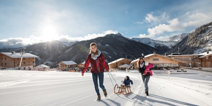 Familienhotel - Skikurs direkt beim Hotel - Rodeln am Haus - Almfamilyhotel Scherer****s - Familotel Osttirol