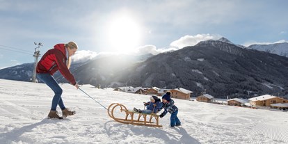Familienhotel - Skikurs direkt beim Hotel - Schlitten fahren - Almfamilyhotel Scherer****s - Familotel Osttirol