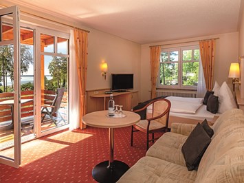 Aparthotel Am See Zimmerkategorien Doppelzimmer / Apartment mit Balkon (Haupthaus)